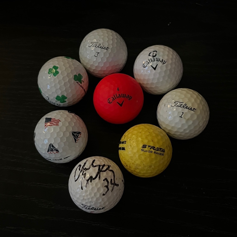 Callaway and Titleist Golf Balls Set + Signed ball? Not sure by who.